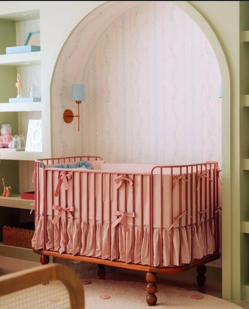 Blush Pink Nursery with an Arched Crib Nook