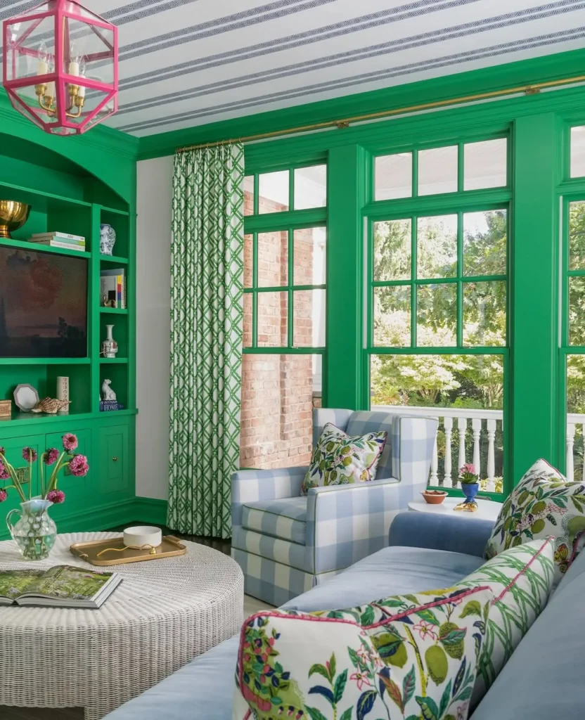Bold Green Sunroom with Patterned Curtains