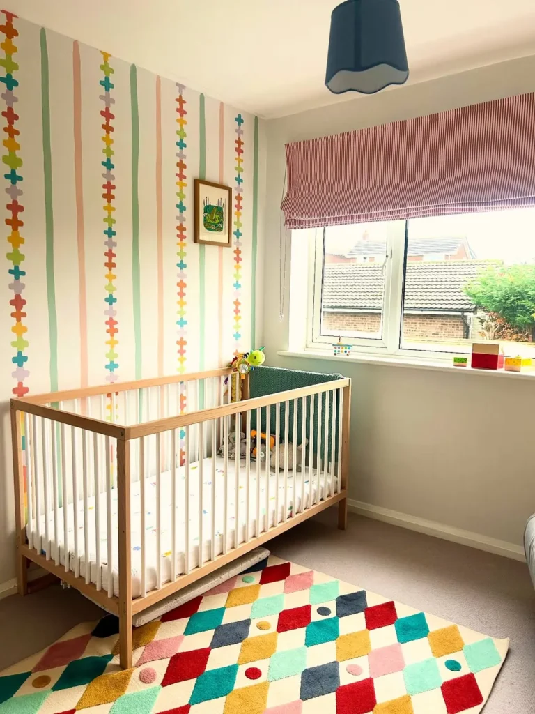 Colorful Nursery With Fun Stripe Wall Design