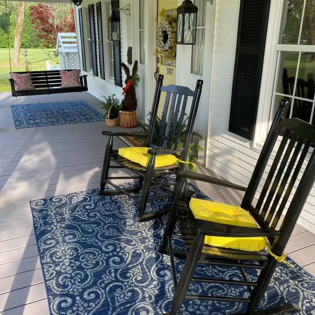 Front Porch with Black Rocking Chairs