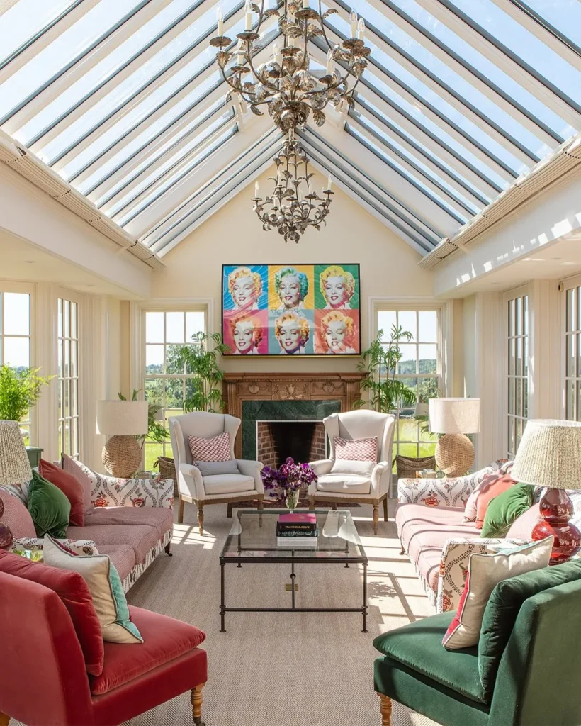 Grand Sunroom with Fireplace and Statement Chandelier