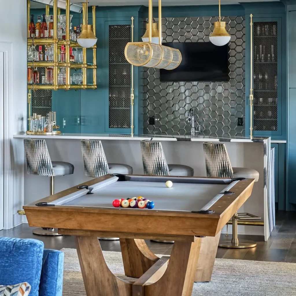 Luxury Home Bar with Pool Table and Brass Accents