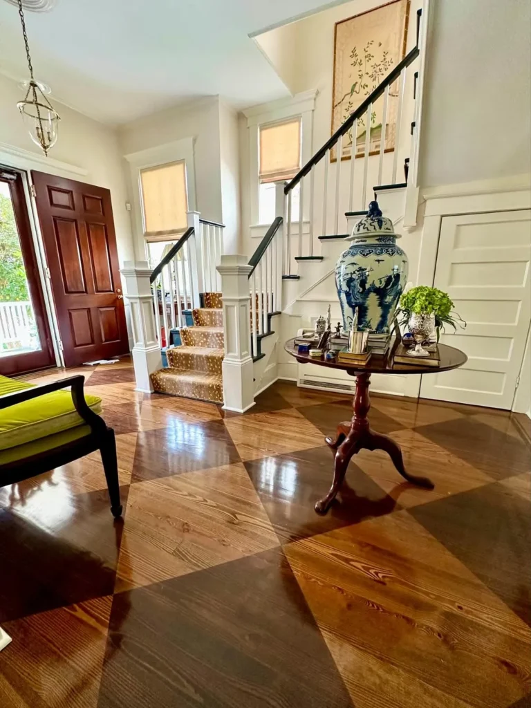 Polished Stair Hall with a Blue-and-White Accent Vase