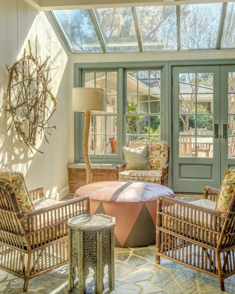 Soft Green Sunroom with Rattan Chairs