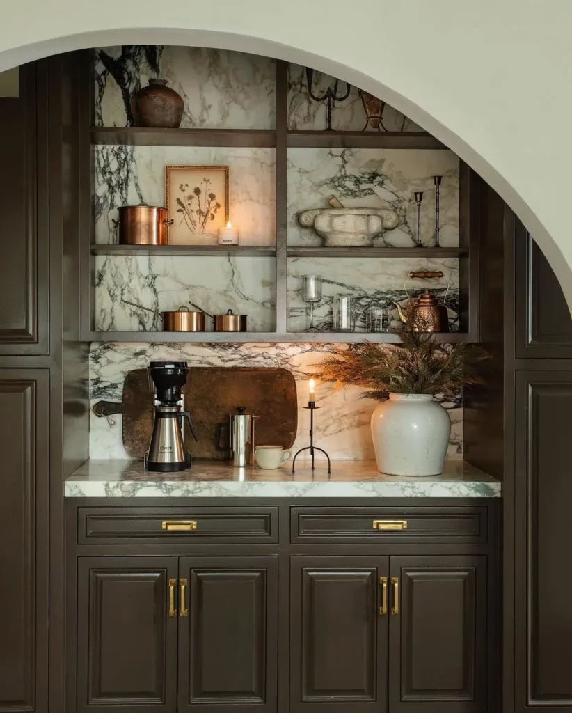 Arched Marble Coffee Nook with Dark Cabinetry
