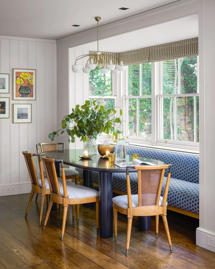 Blue Window Bench with a Sleek Dining Table