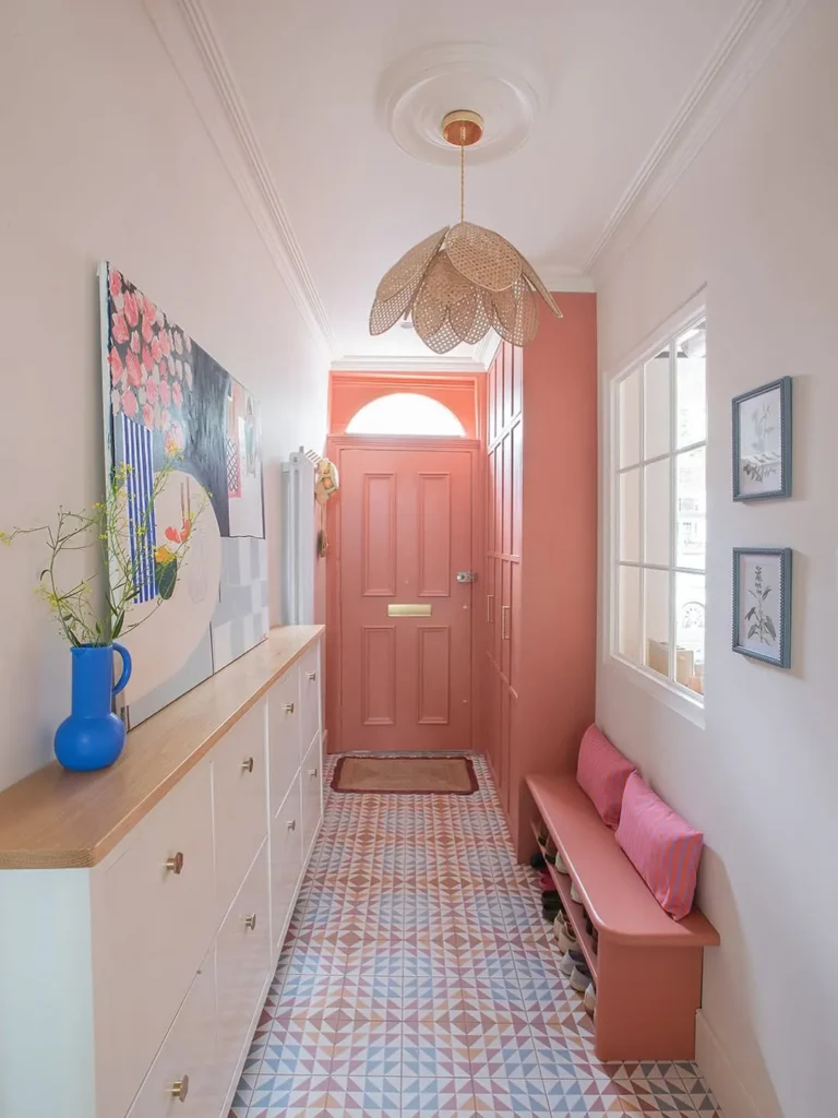 Blush Pink Entry Hall with Patterned Tile Floor