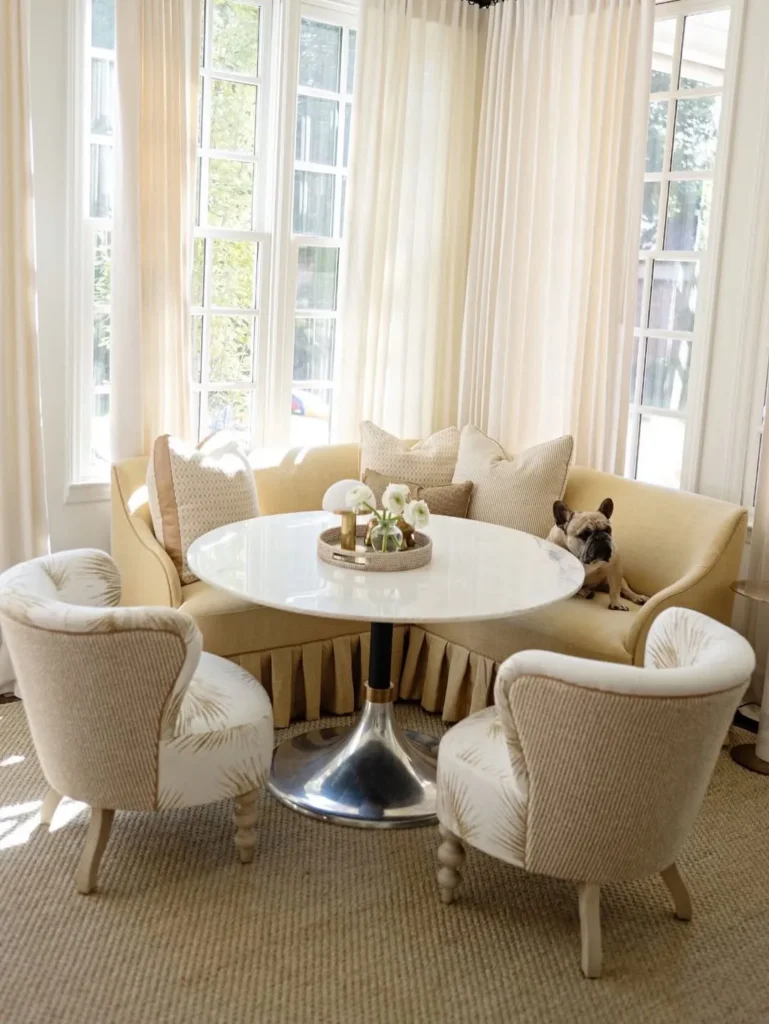 Cream Banquette Seating for a Light-Filled Dining Spot