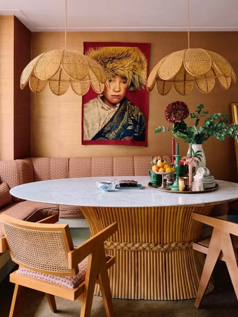 Dining Nook With Statement Portrait Wall Decor