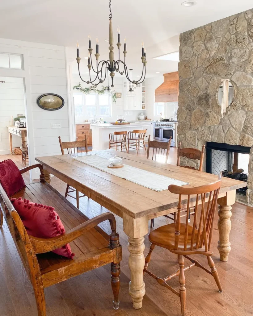 Farmhouse Dining Area with Stone Fireplace
