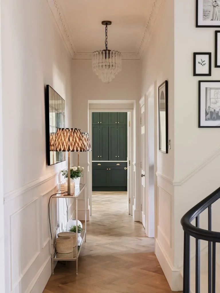 High Ceiling Hall with Chandelier and Slim Console