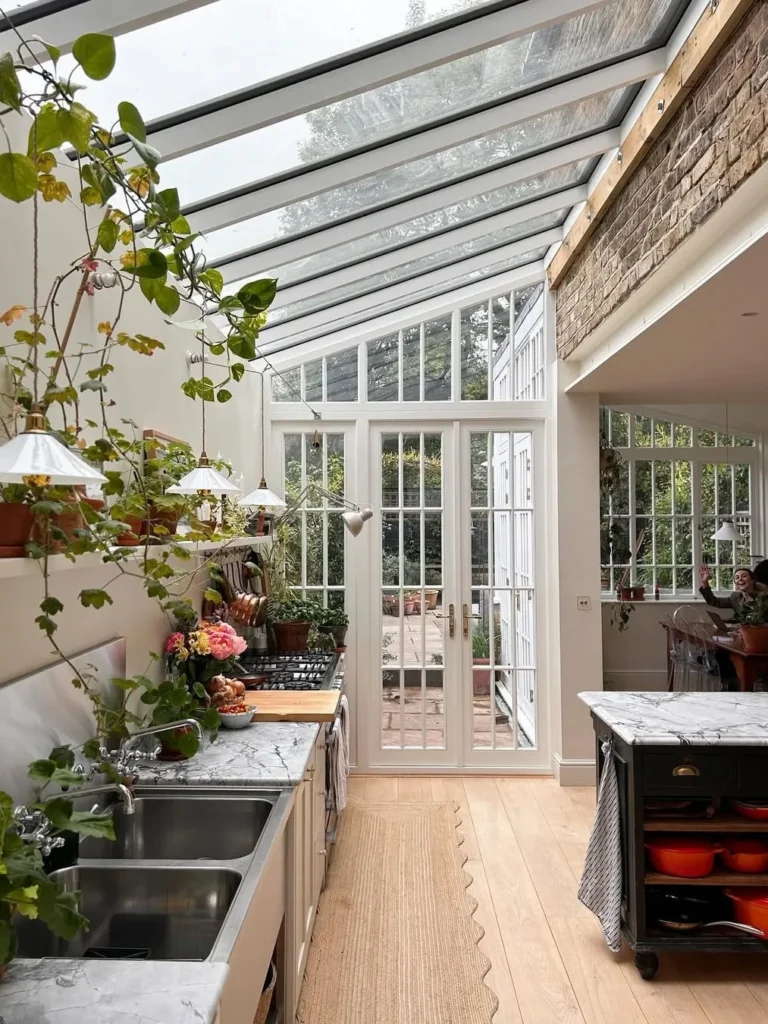 Plant-Filled Glass Roof Kitchen