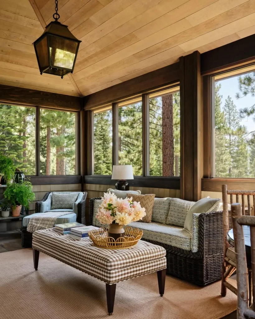 Rustic Screened Porch with Wicker Sofa and Ottoman