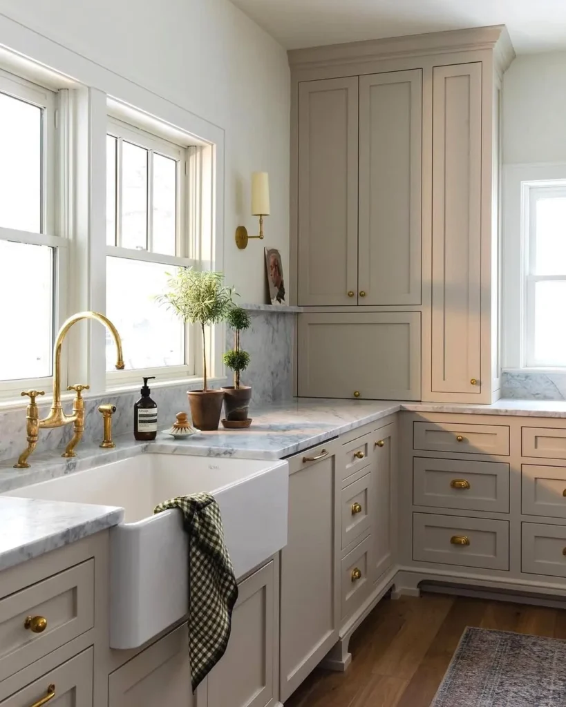 Soft Greige Cabinets with Marble Counters