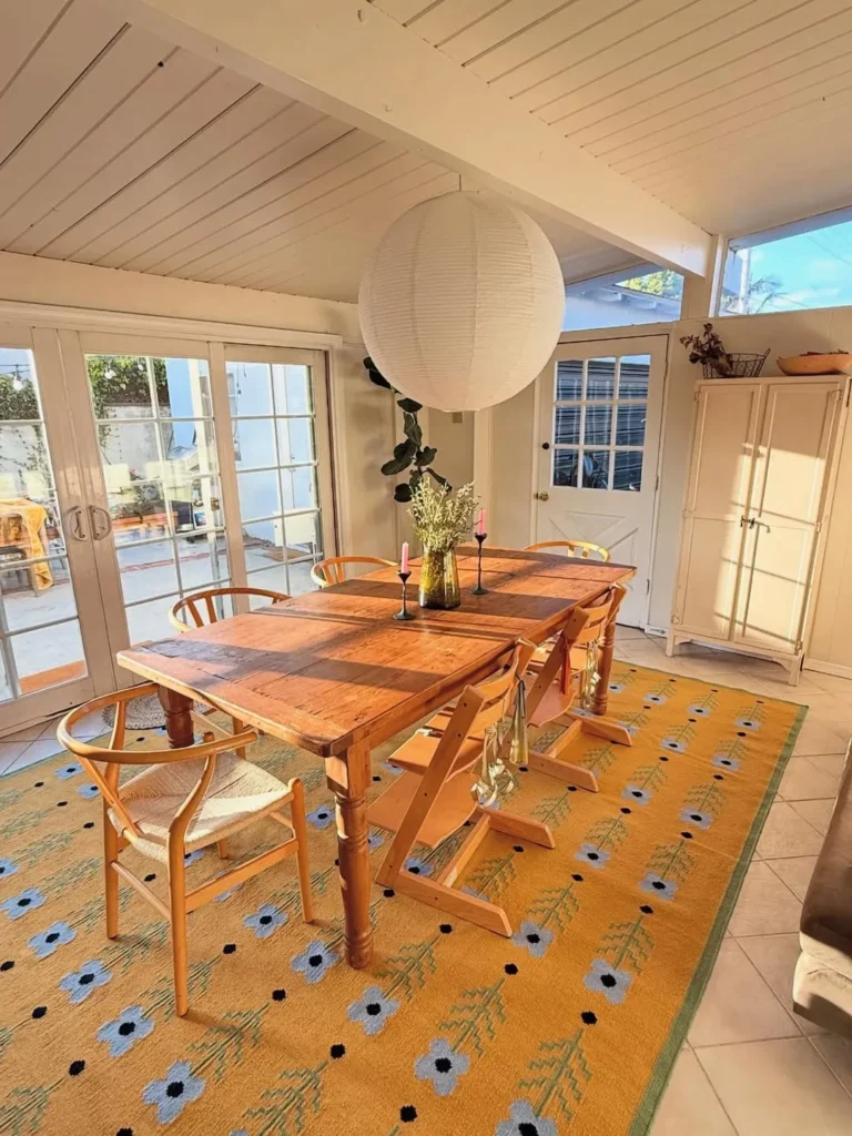 Sunny Dining Space With Statement Rug