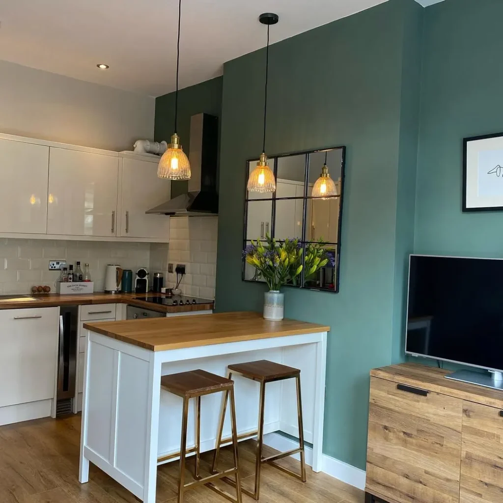Teal Accent Wall Kitchen with Small Island