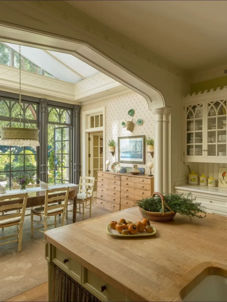 Traditional Sunroom Kitchen With Butcher Block Island