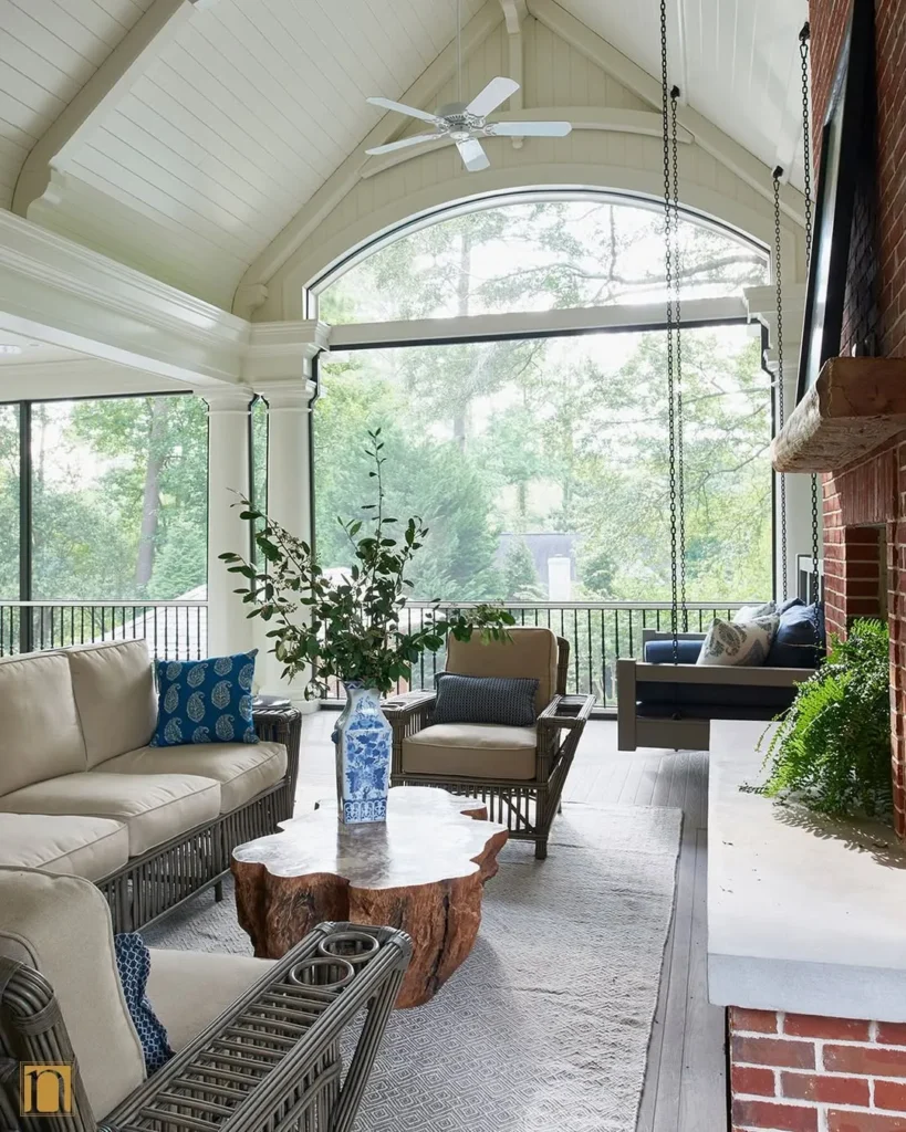 Vaulted Screened Porch with Swing Bed and Fireplace