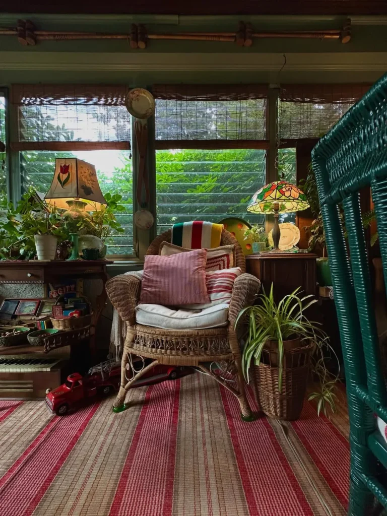 Vintage Porch Corner with Plants and Rattan Chair
