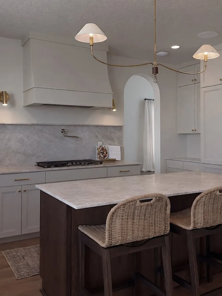 Warm Gray Cabinets with a Dark Wood Island