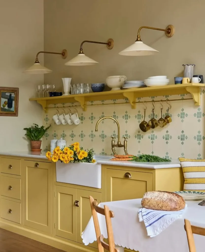 Warm Yellow Cottage Kitchen with Brass Details