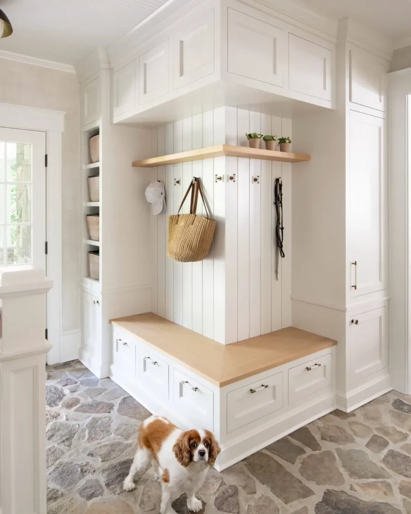 White Corner Bench with Built-In Cabinet Wall