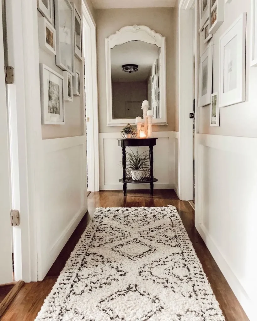 White Framed Hallway with Mirror and Runner Rug