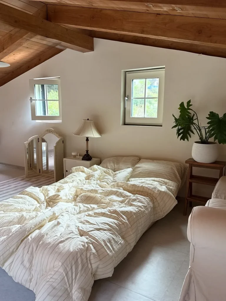 Airy Attic Bedroom With Exposed Timber Beams