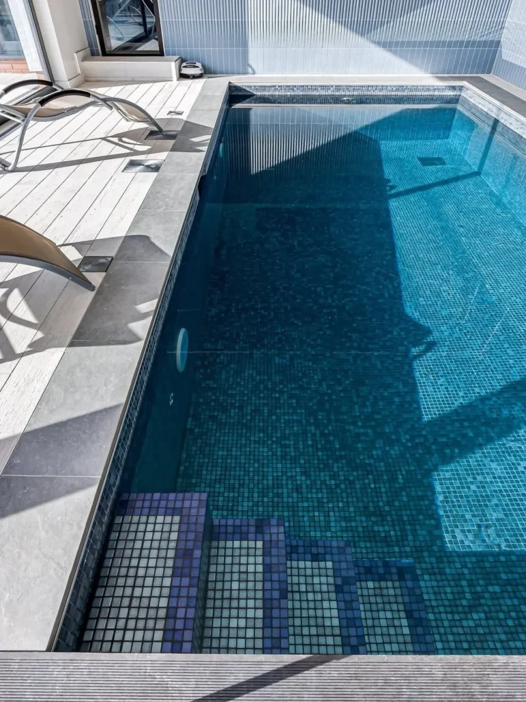 Blue Mosaic Indoor Pool With Spa Corner
