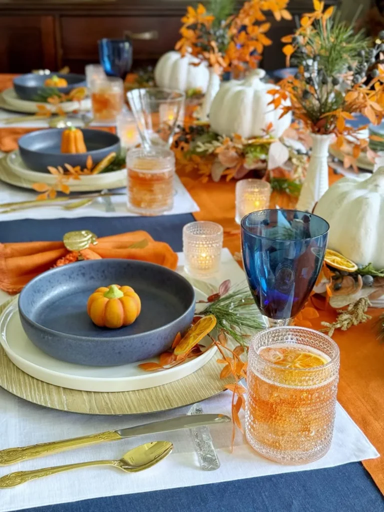 Blue and Orange Autumn Table Settings for Thanksgiving Hosting