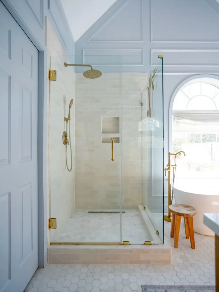 Blue and White Bathroom With Glass Walk-In Shower