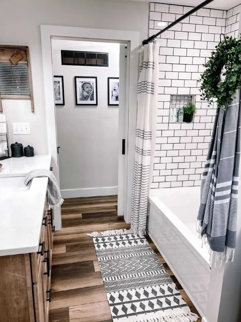 Bright Farmhouse Bathroom With Freestanding Tub
