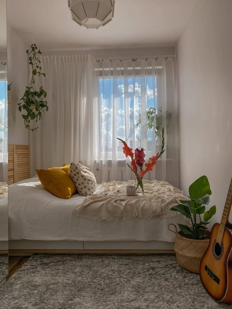 Bright Small Bedroom With Plants and Soft Textures