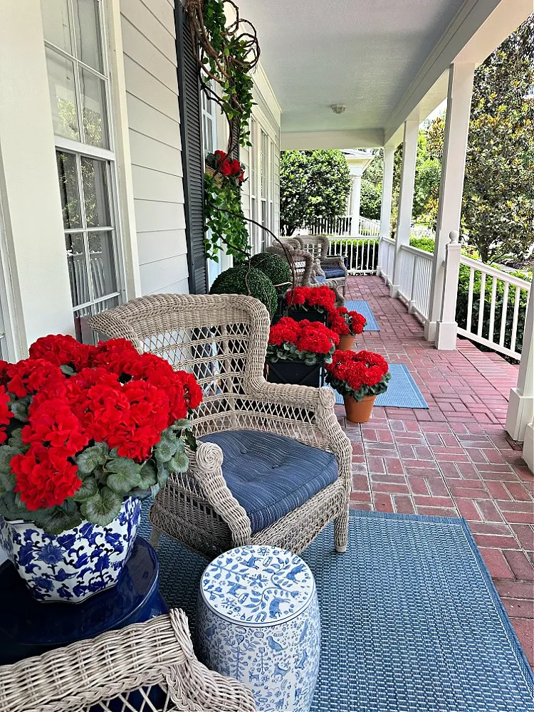 Classic Southern Porch With Red Geranium Displays