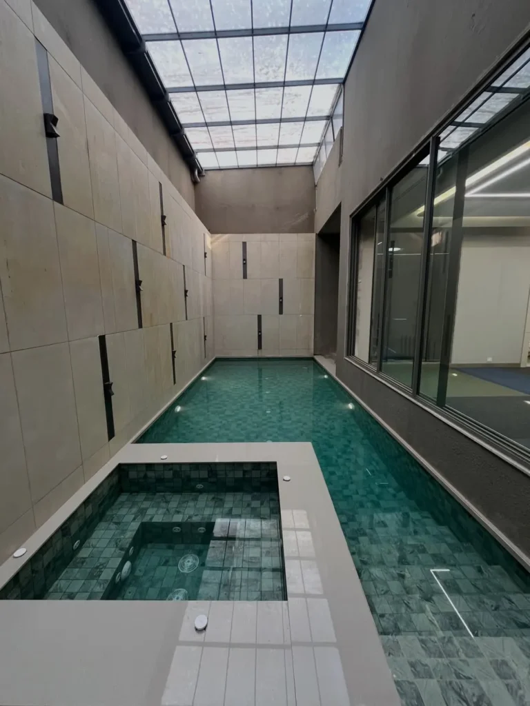 Courtyard Indoor Pool With Glass Roof and Spa