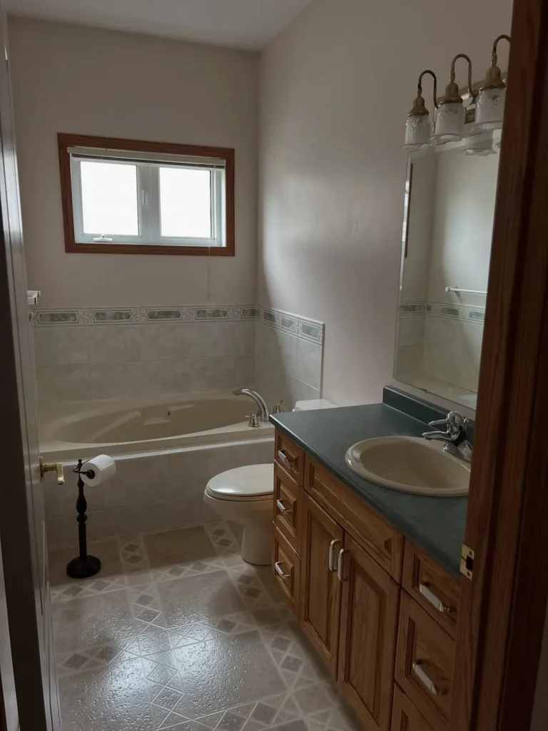 Cozy White Bathroom With Timeless Cottage Style