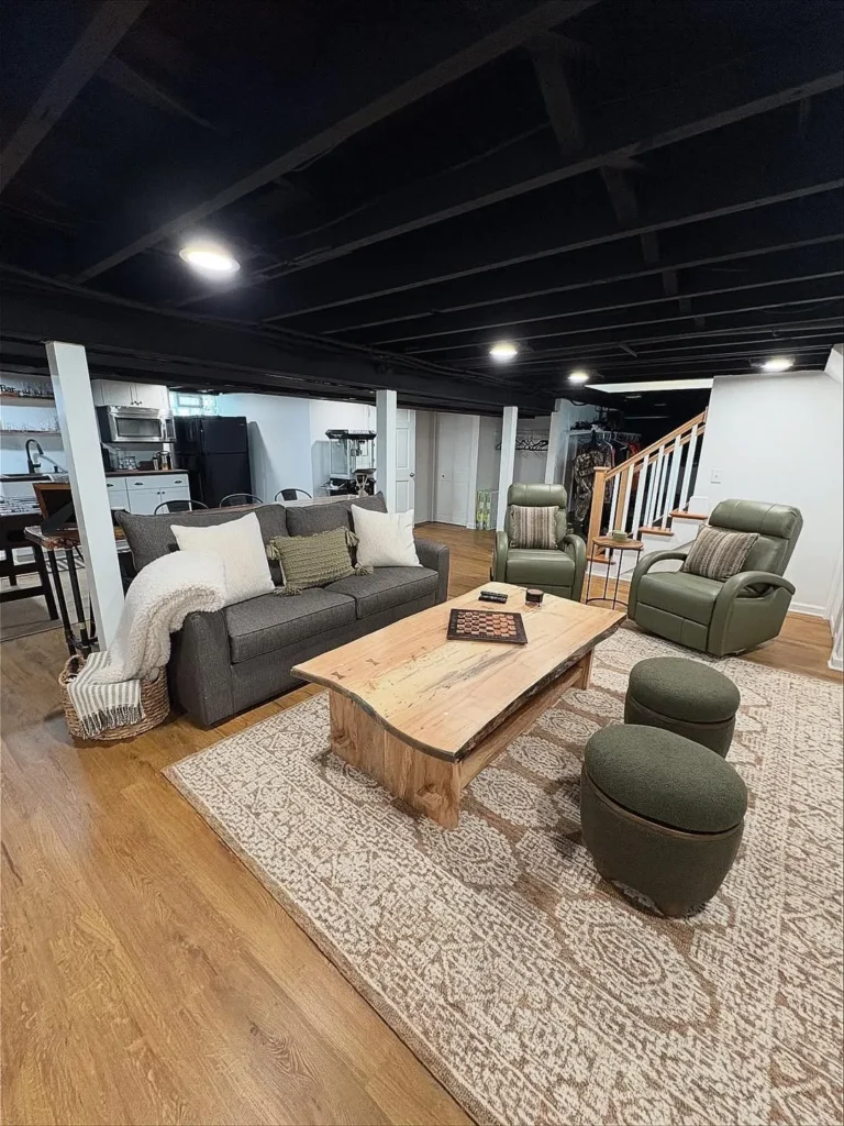 Finished Basement With Black Exposed Ceiling
