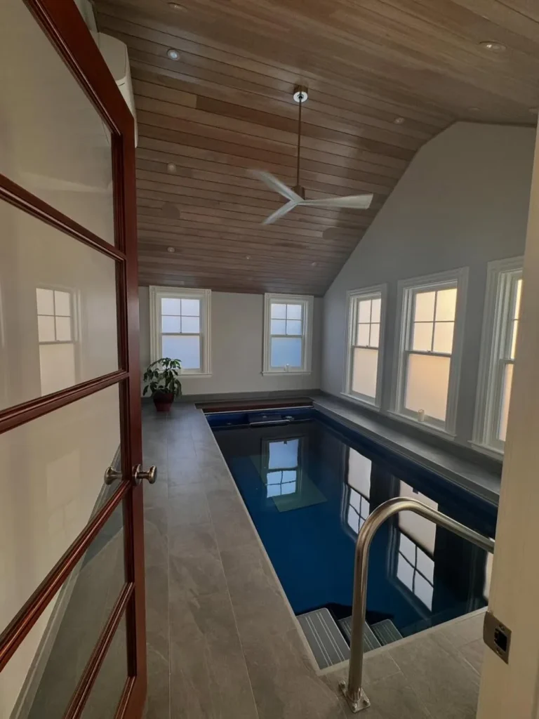 Indoor Lap Pool With Vaulted Wood Ceiling