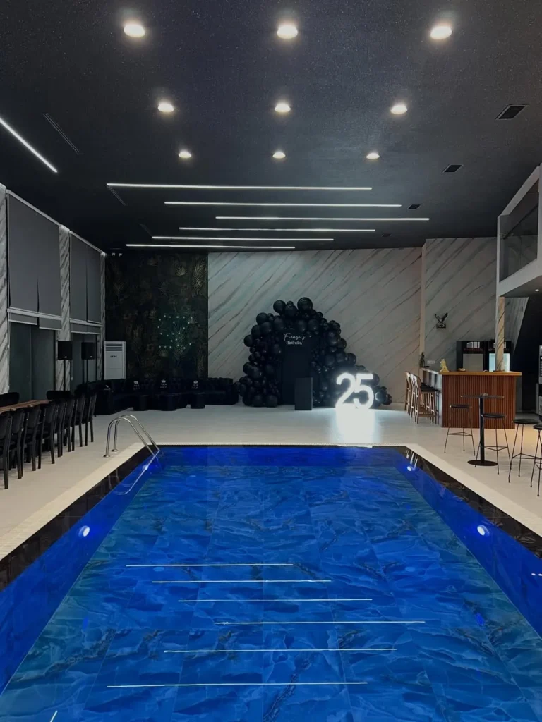 Luxury Indoor Pool Lounge With Modern Lighting