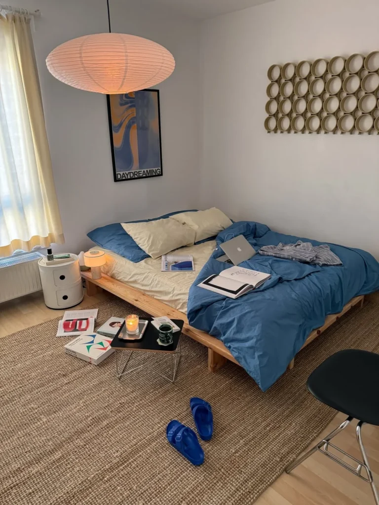 Minimal Cozy Bedroom With Blue Bedding Accents