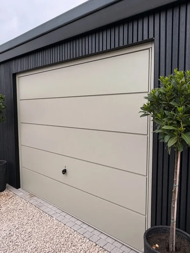Minimalist Garage Door Design With Modern Black Cladding