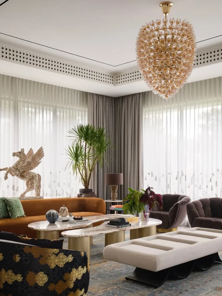 Modern Glam Living Room With Statement Lighting