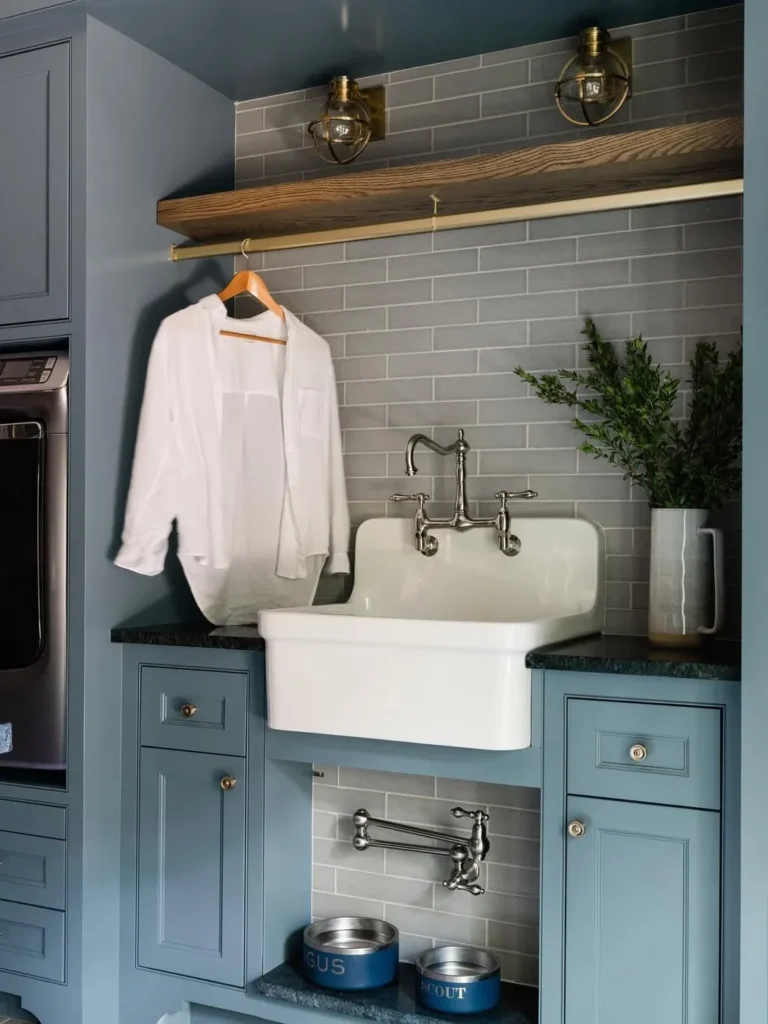 Moody Blue Laundry Room With Classic Farm Sink