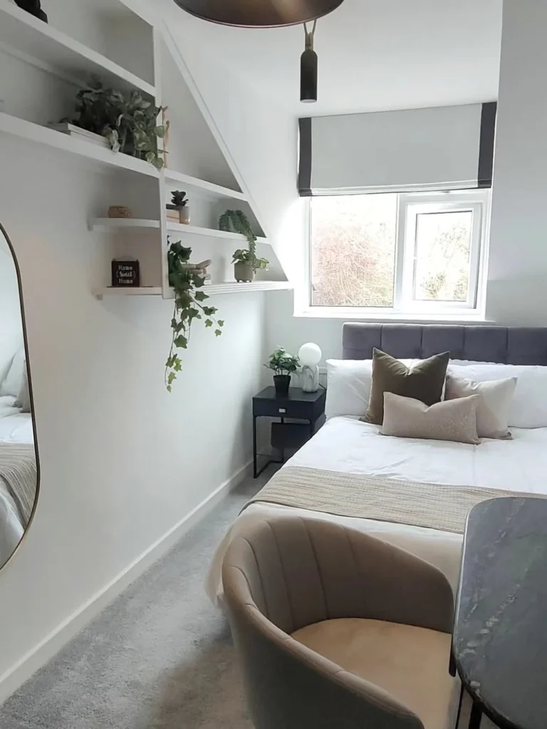 Small Bedroom With Floating Shelves and Soft Neutrals