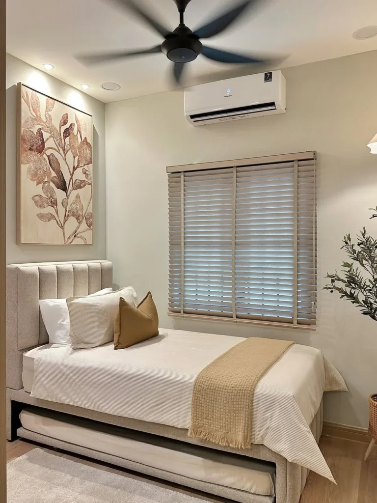 Small Guest Room With Upholstered Trundle Bed