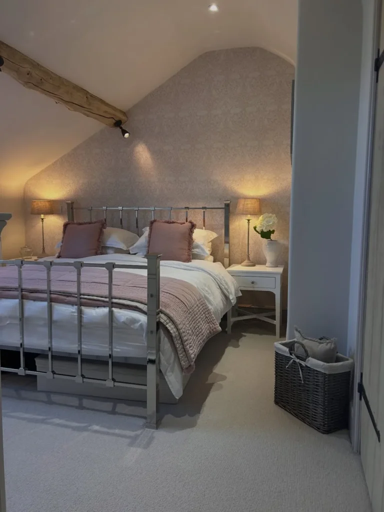 Soft Pink Attic Bedroom With Vintage Touches