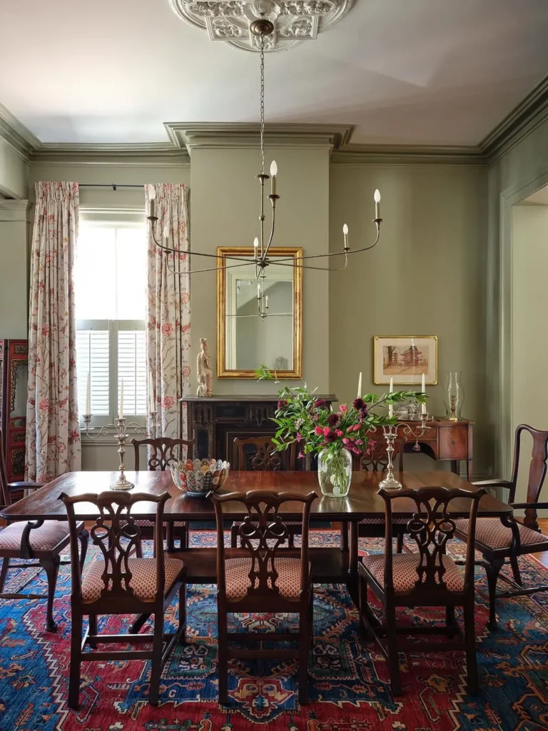 Traditional Green Dining Room With Antique Charm