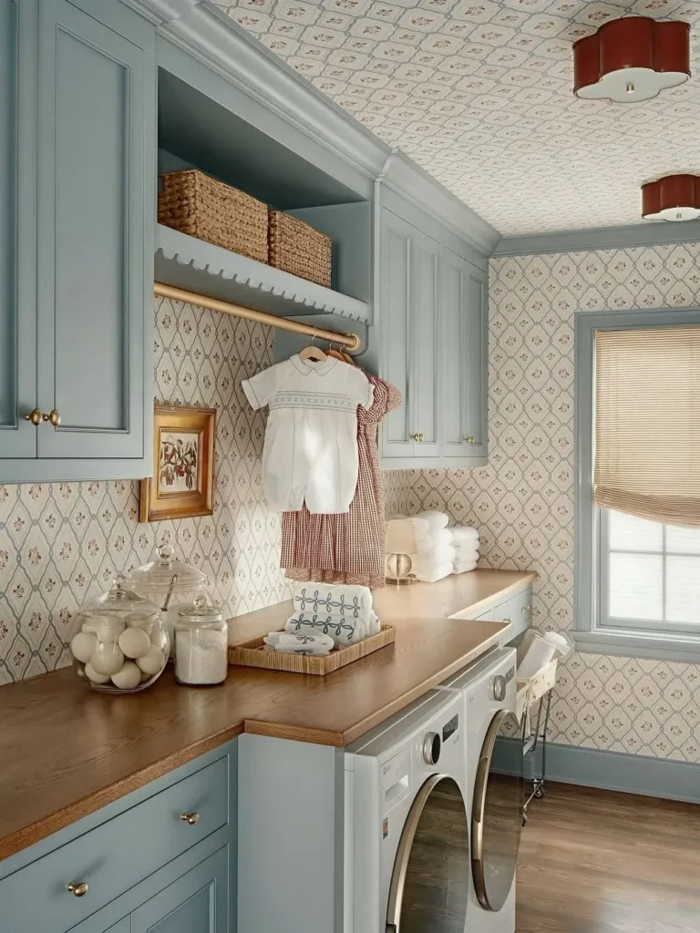 Vintage Wallpaper Laundry Room With Soft Blue Cabinets