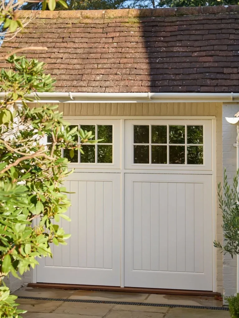 White Carriage Style Garage Door With Gridded Windows