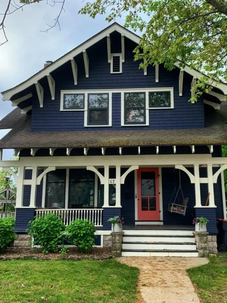 Classic Dark Blue Craftsman House With White Trim